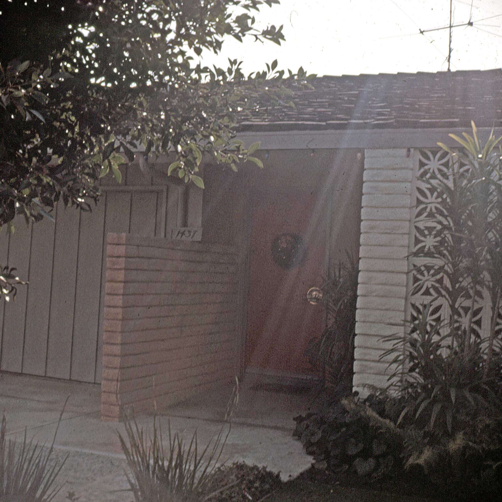 Outside door scene scanned by Affordable—full frame with clean edges