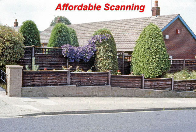 Affordable Scanning—house with fences, corrected color and contrast